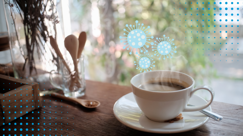 an image of a steaming cup of coffee with mold spores wafting out of the steam